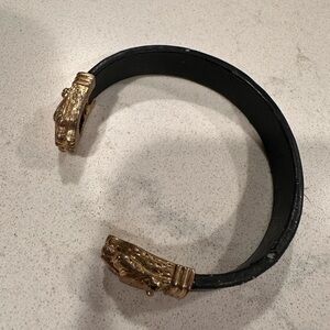 Jewelmint Gold and Black Cuff with Animal Head Design